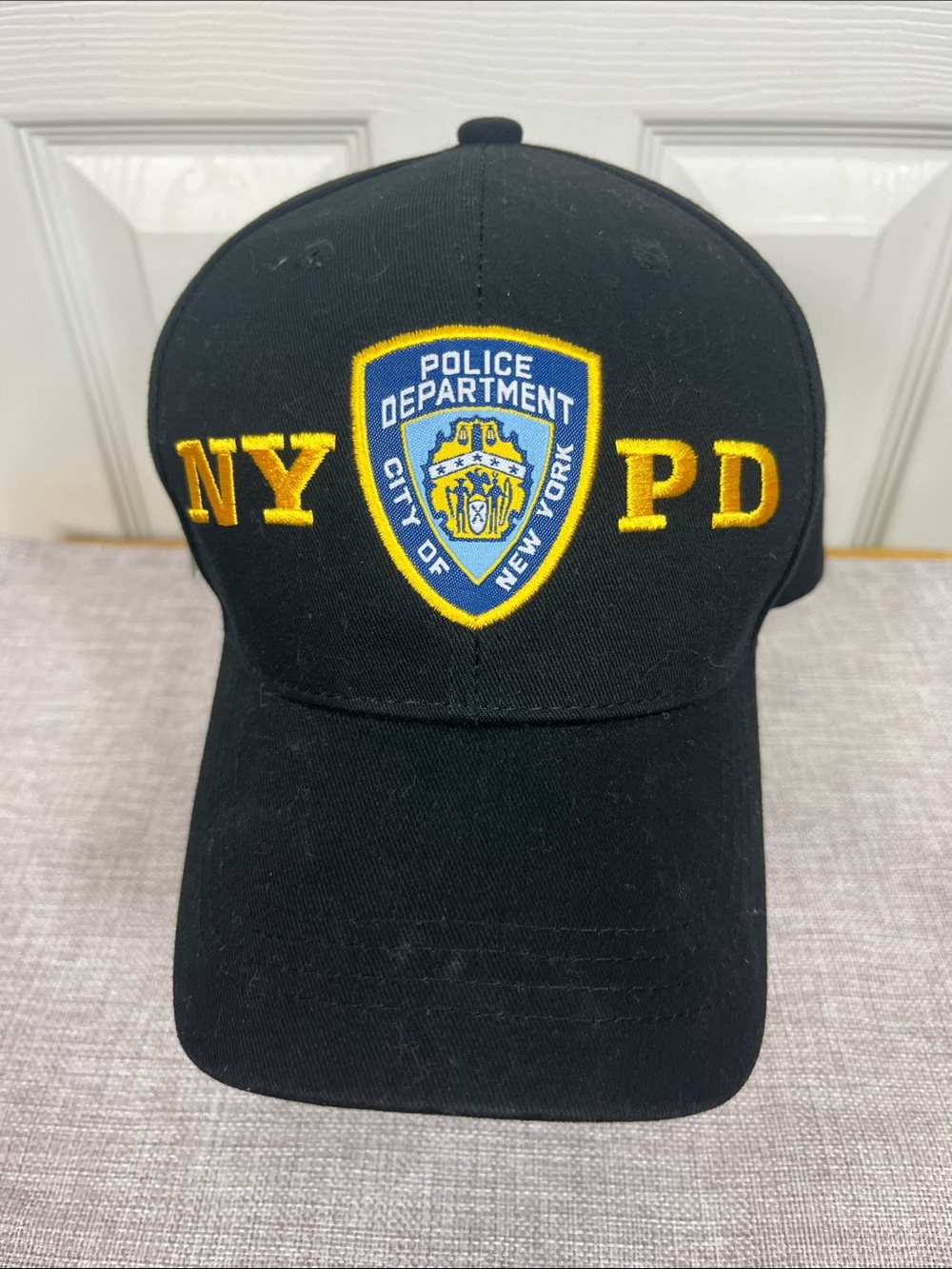 NWT Authentic NYPD black hat. Velcro strap in back.